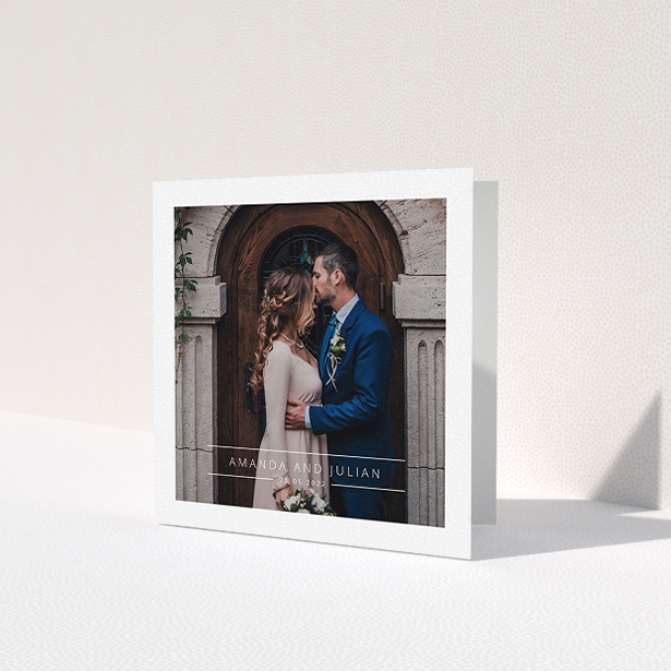 A wedding thank you card called 'Tramlines'. It is a square (148mm x 148mm) card in a square orientation. It is a photographic wedding thank you card with room for 1 photo. 'Tramlines' is available as a folded card, with mainly white colouring.