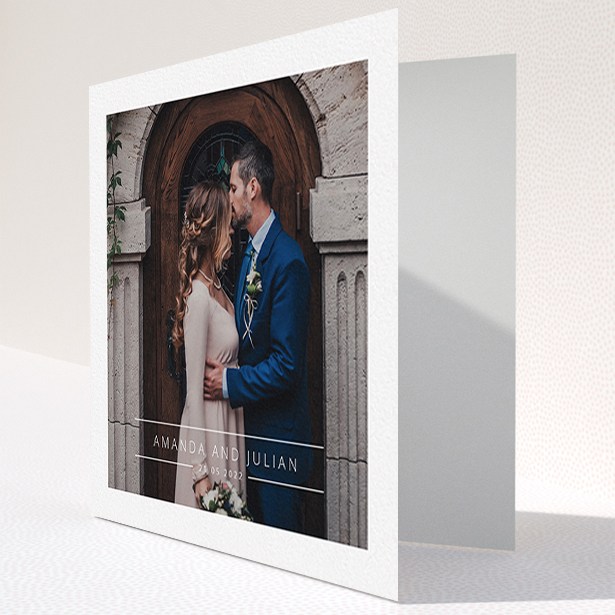 A wedding thank you card called "Tramlines". It is a square (148mm x 148mm) card in a square orientation. It is a photographic wedding thank you card with room for 1 photo. "Tramlines" is available as a folded card, with mainly white colouring.
