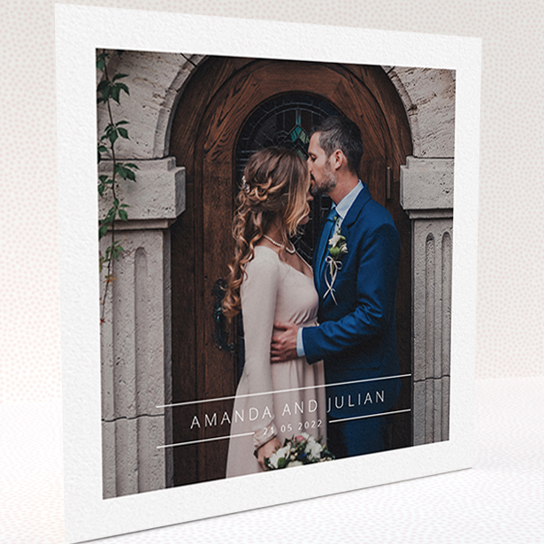 A wedding thank you card called "Tramlines". It is a square (148mm x 148mm) card in a square orientation. It is a photographic wedding thank you card with room for 1 photo. "Tramlines" is available as a folded card, with mainly white colouring.