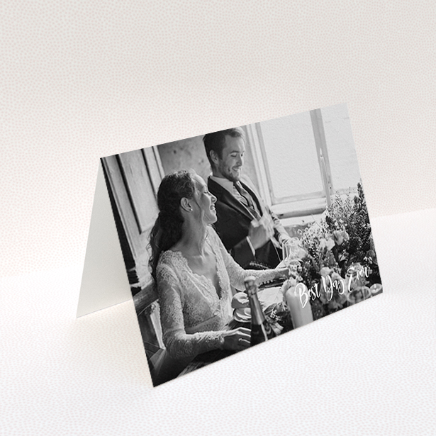 A wedding thank you card named "Truly It Was". It is an A6 card in a landscape orientation. It is a photographic wedding thank you card with room for 1 photo. "Truly It Was" is available as a folded card, with mainly white colouring.