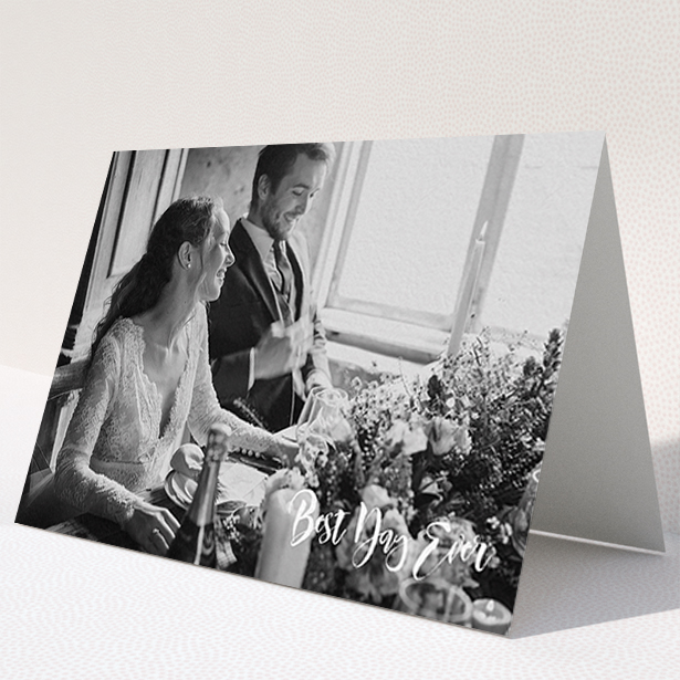 A wedding thank you card named "Truly It Was". It is an A6 card in a landscape orientation. It is a photographic wedding thank you card with room for 1 photo. "Truly It Was" is available as a folded card, with mainly white colouring.