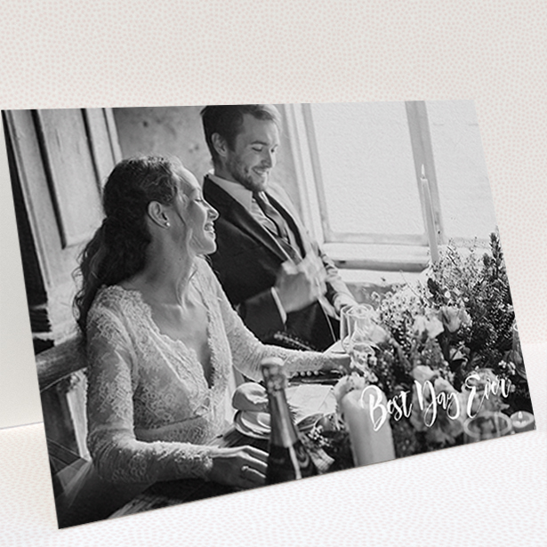 A wedding thank you card named "Truly It Was". It is an A6 card in a landscape orientation. It is a photographic wedding thank you card with room for 1 photo. "Truly It Was" is available as a folded card, with mainly white colouring.