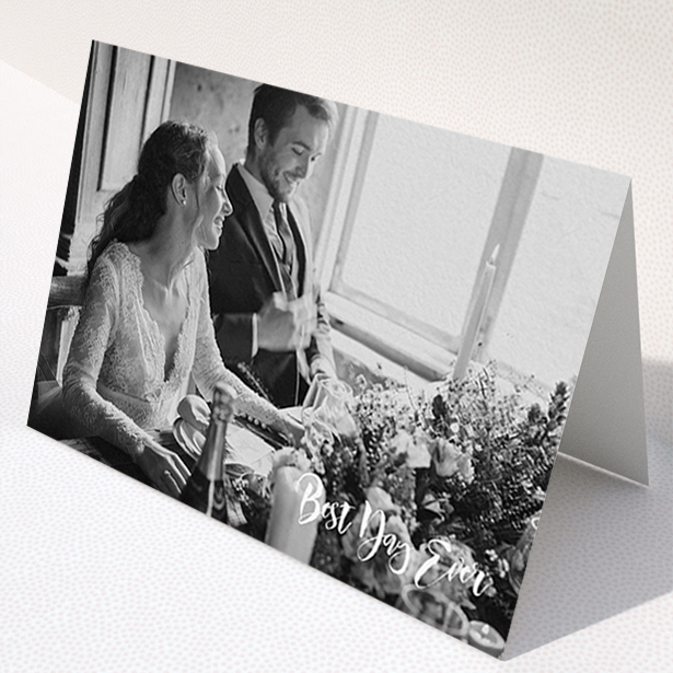 A wedding thank you card named "Truly It Was". It is an A6 card in a landscape orientation. It is a photographic wedding thank you card with room for 1 photo. "Truly It Was" is available as a folded card, with mainly white colouring.