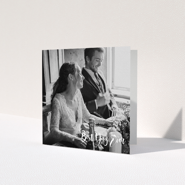 A wedding thank you card named 'Truly It Was'. It is a square (148mm x 148mm) card in a square orientation. It is a photographic wedding thank you card with room for 1 photo. 'Truly It Was' is available as a folded card, with mainly white colouring.