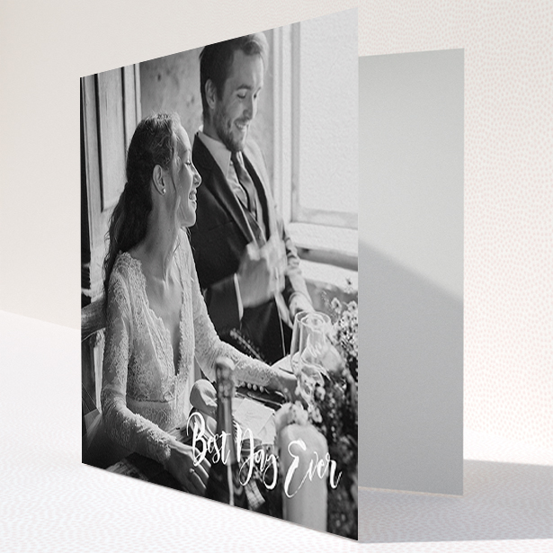A wedding thank you card named "Truly It Was". It is a square (148mm x 148mm) card in a square orientation. It is a photographic wedding thank you card with room for 1 photo. "Truly It Was" is available as a folded card, with mainly white colouring.