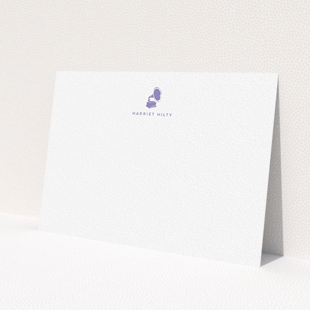 A womens correspondence card design titled 'Purple music'. It is an A6 card in a landscape orientation. 'Purple music' is available as a flat card, with tones of white and purple.