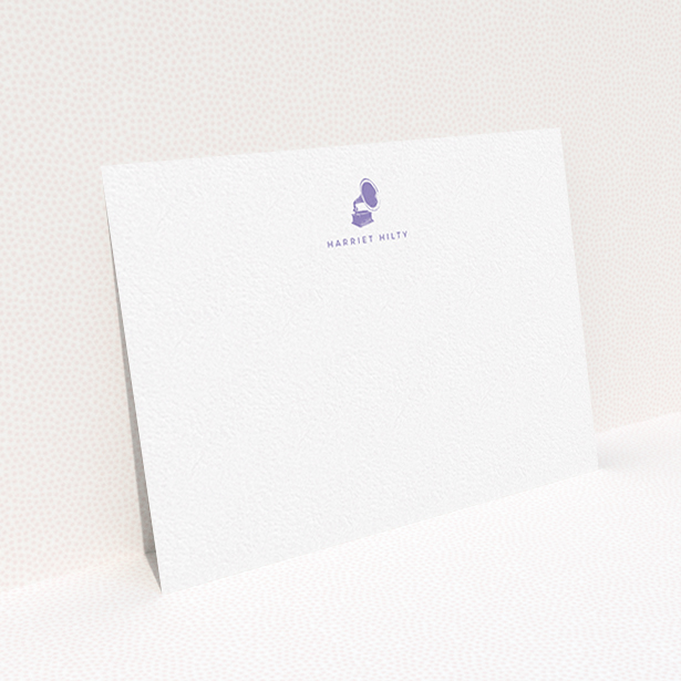 A womens correspondence card design titled "Purple music". It is an A6 card in a landscape orientation. "Purple music" is available as a flat card, with tones of white and purple.