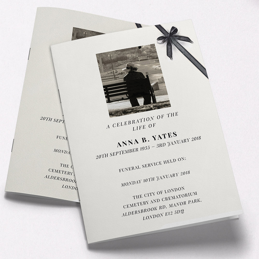 A pale cream and faded black, a5 portrait multipage funeral order of service with an elegant style.