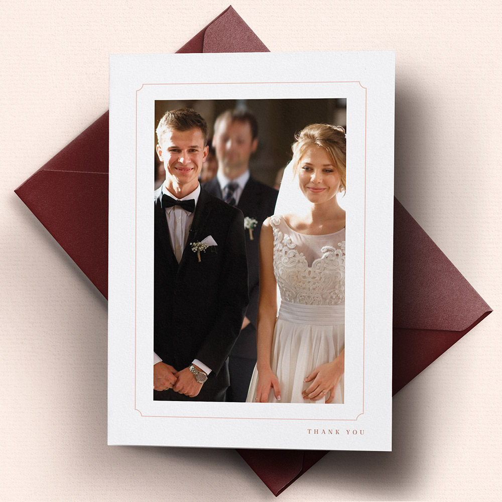A white and pink, a5 portrait folded wedding thank you card with a modern style.