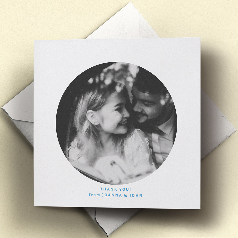 A white and blue, square premium wedding thank you card with a romantic style.