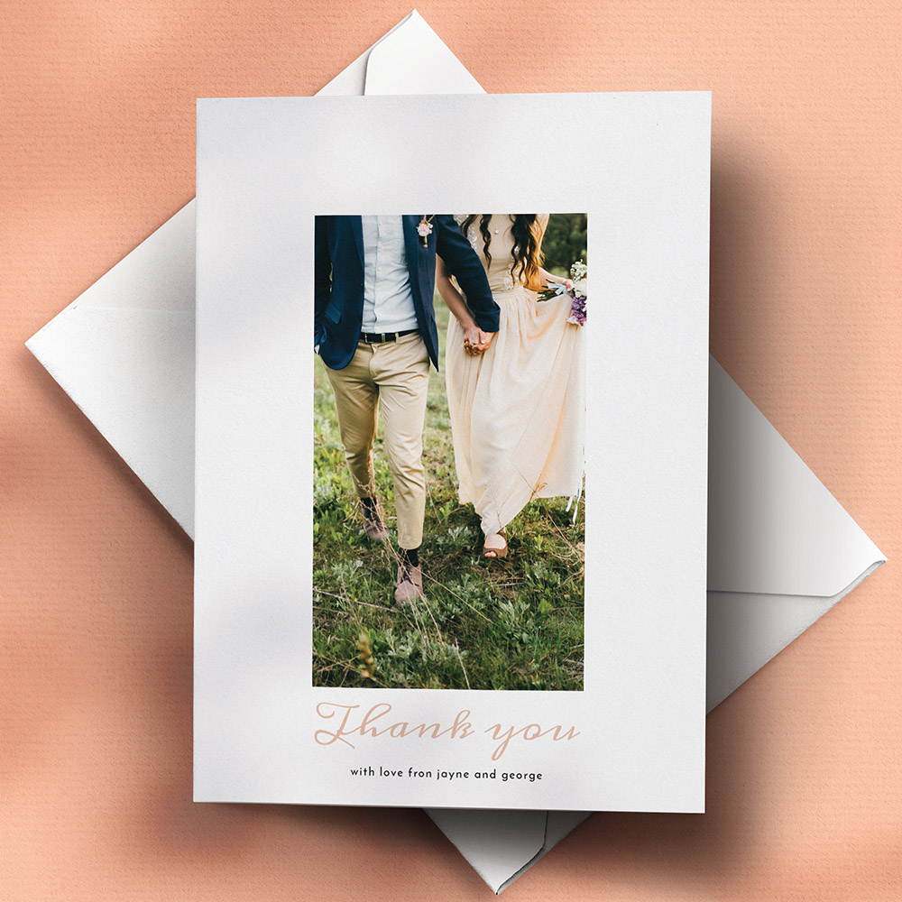 A white and pink, a5 portrait traditional wedding thank you card with a simple style.