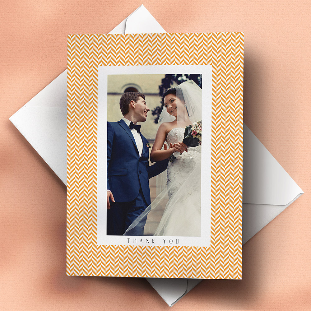 A orange and white, a6 portrait the best wedding thank you card with a vintage style.