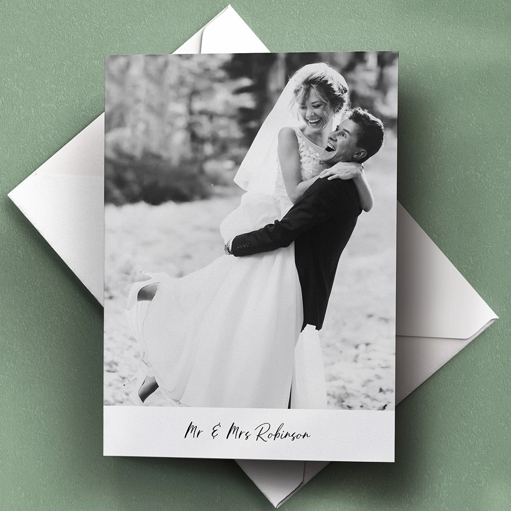A white, a5 portrait simple wedding thank you card with a classic style.