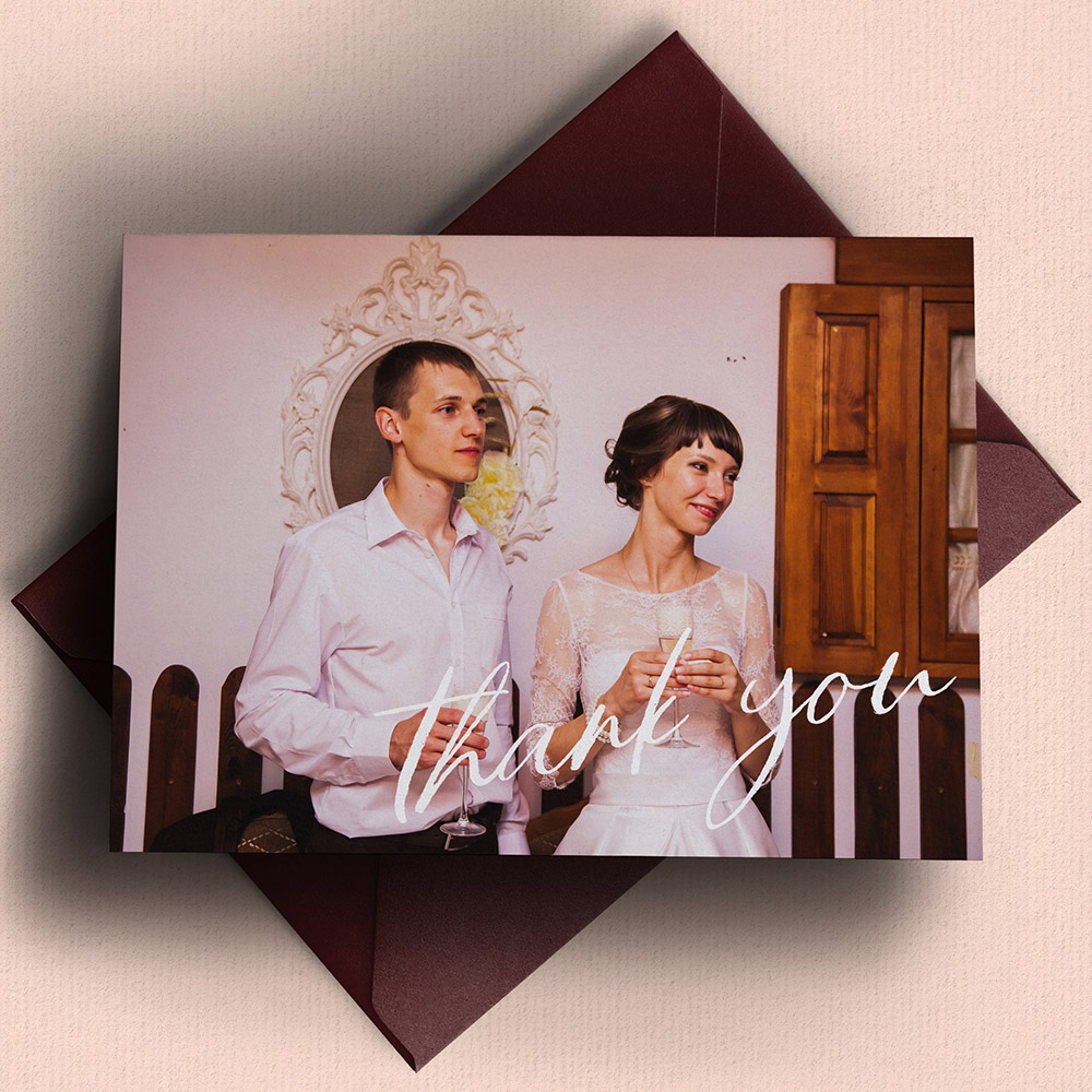 A white, a5 landscape traditional wedding thank you card with a classic style.