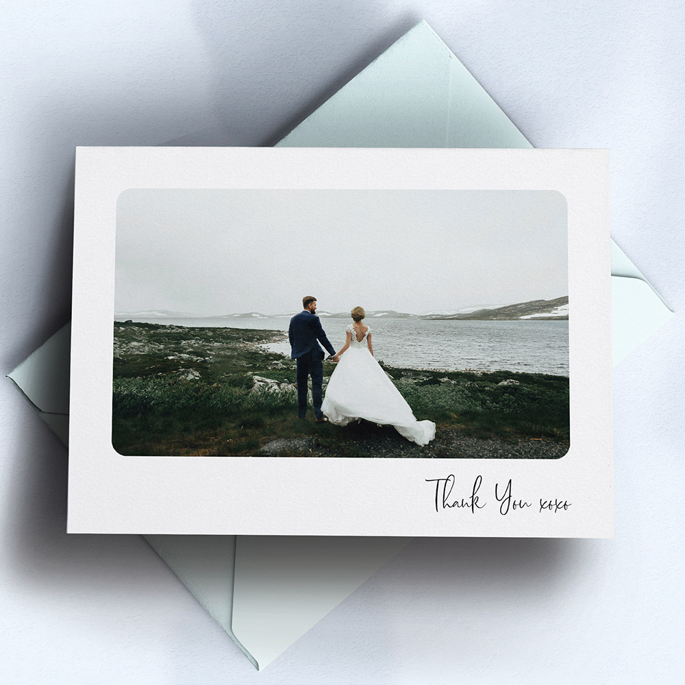 An white, a5 landscape affordable wedding thank you card with a colourful style.