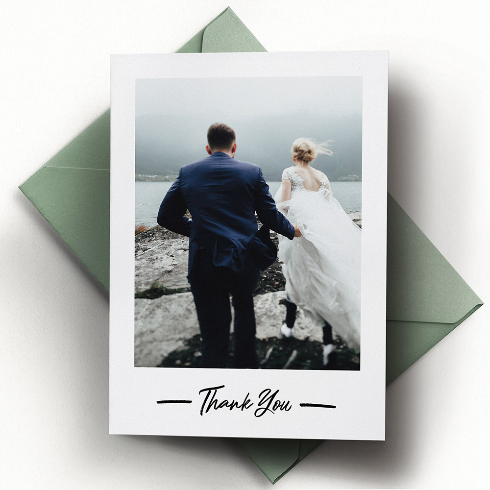 A white, a5 portrait premium wedding thank you card with an elegant style.