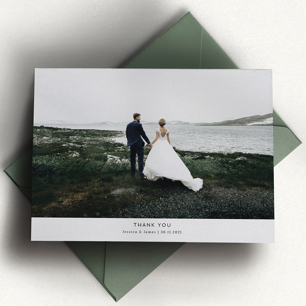 A white, a5 landscape traditional wedding thank you card with a minimalist style.