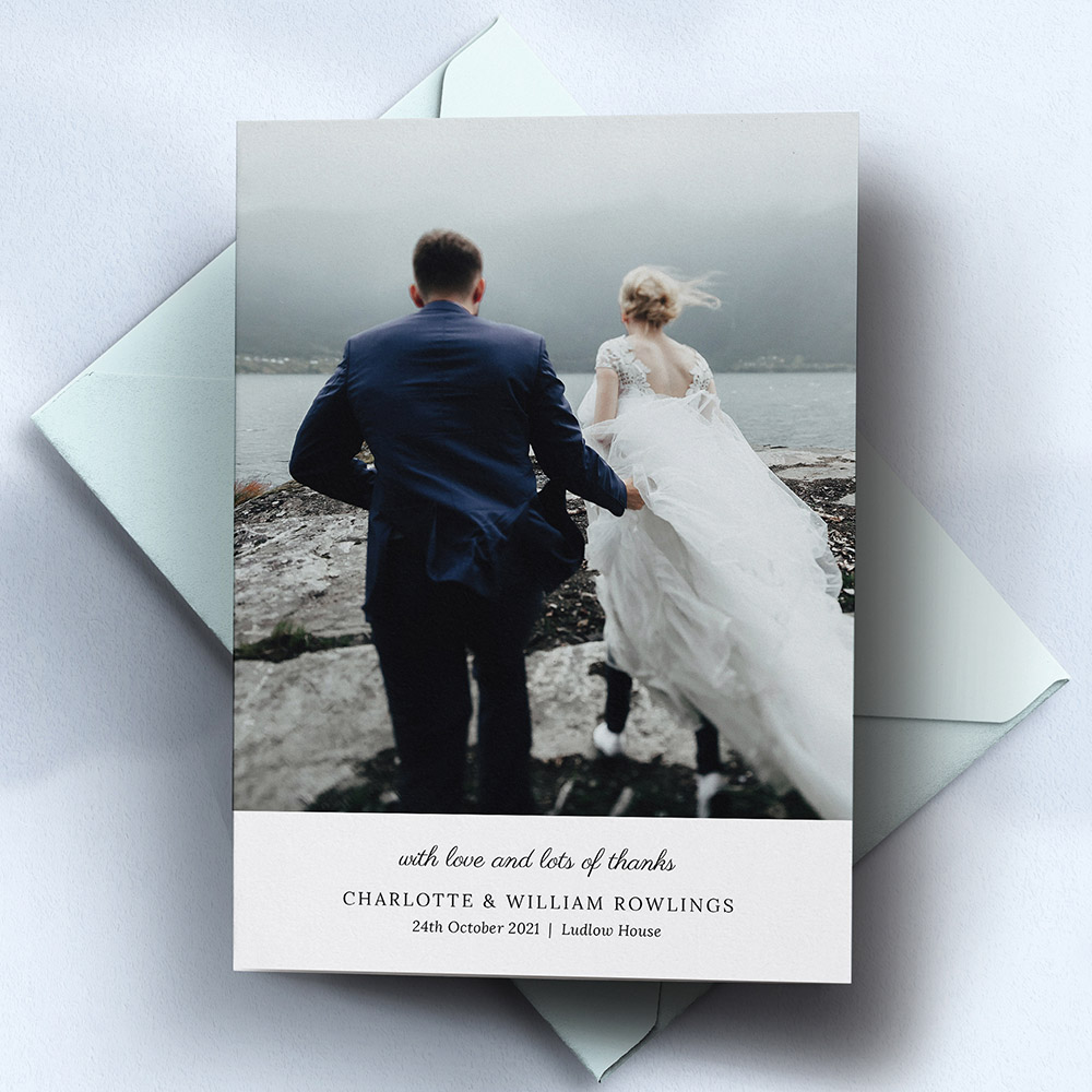 A white, a5 portrait photo wedding thank you card with a modern style.