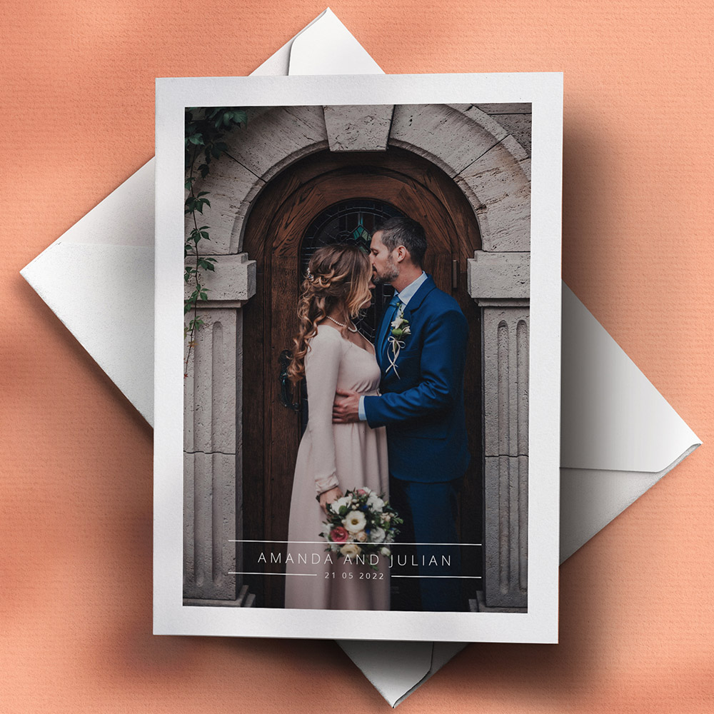 A white, a5 portrait wedding thank you card with photos with a modern style.