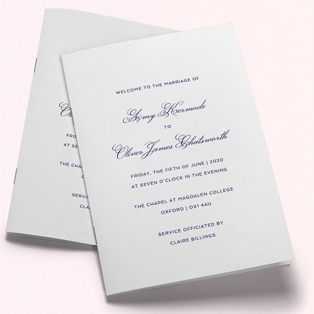 A white and navy blue, a5 portrait multipage wedding programme with a rustic style.
