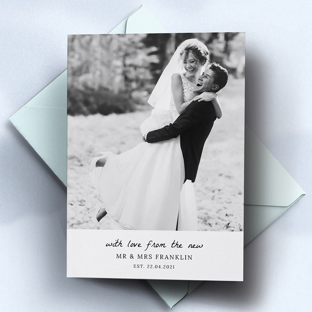 A white, a5 portrait plain wedding thank you card with a rustic style.