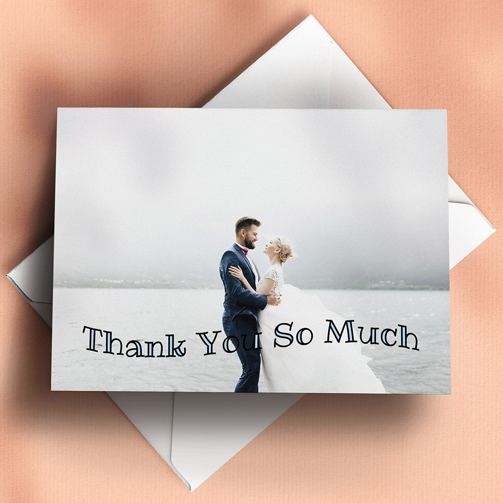 A blue, a6 landscape simple wedding thank you card with a simple style.
