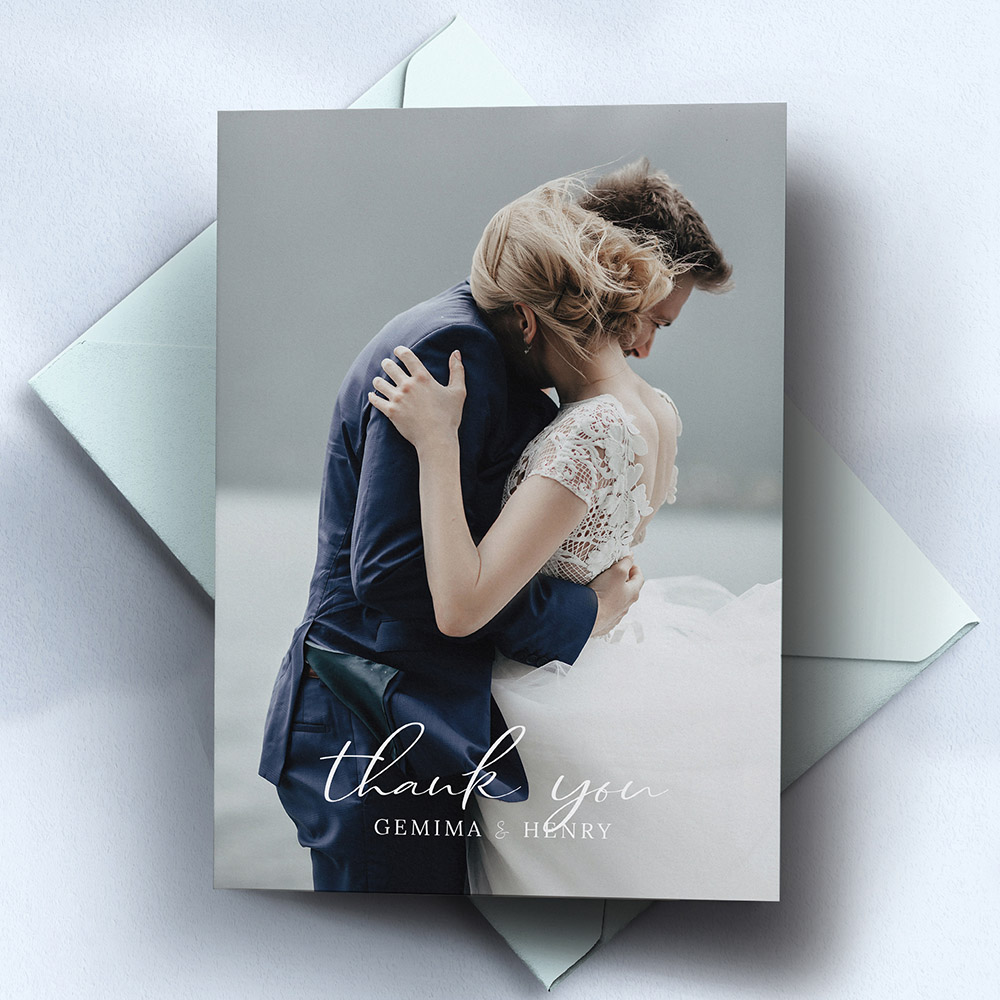 A white, a5 portrait premium wedding thank you card with a traditional style.