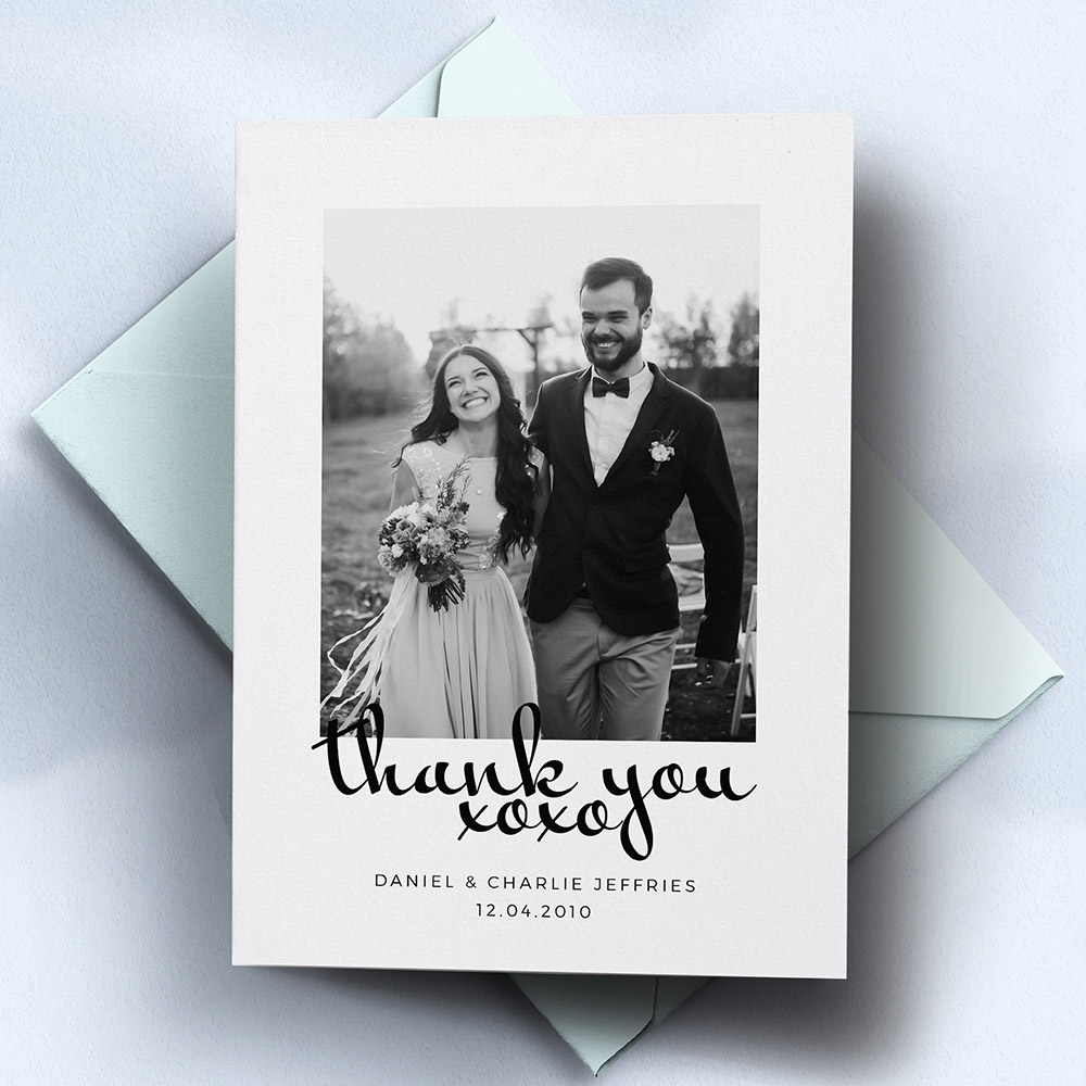A white, a5 portrait traditional wedding thank you card with an unique style.