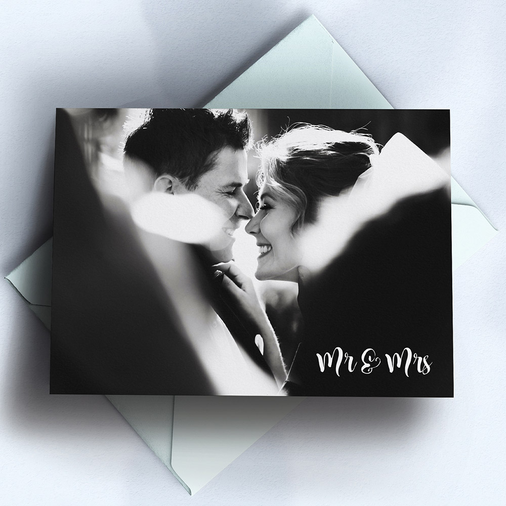 A white, a5 landscape wedding thank you card with photos with an unique style.