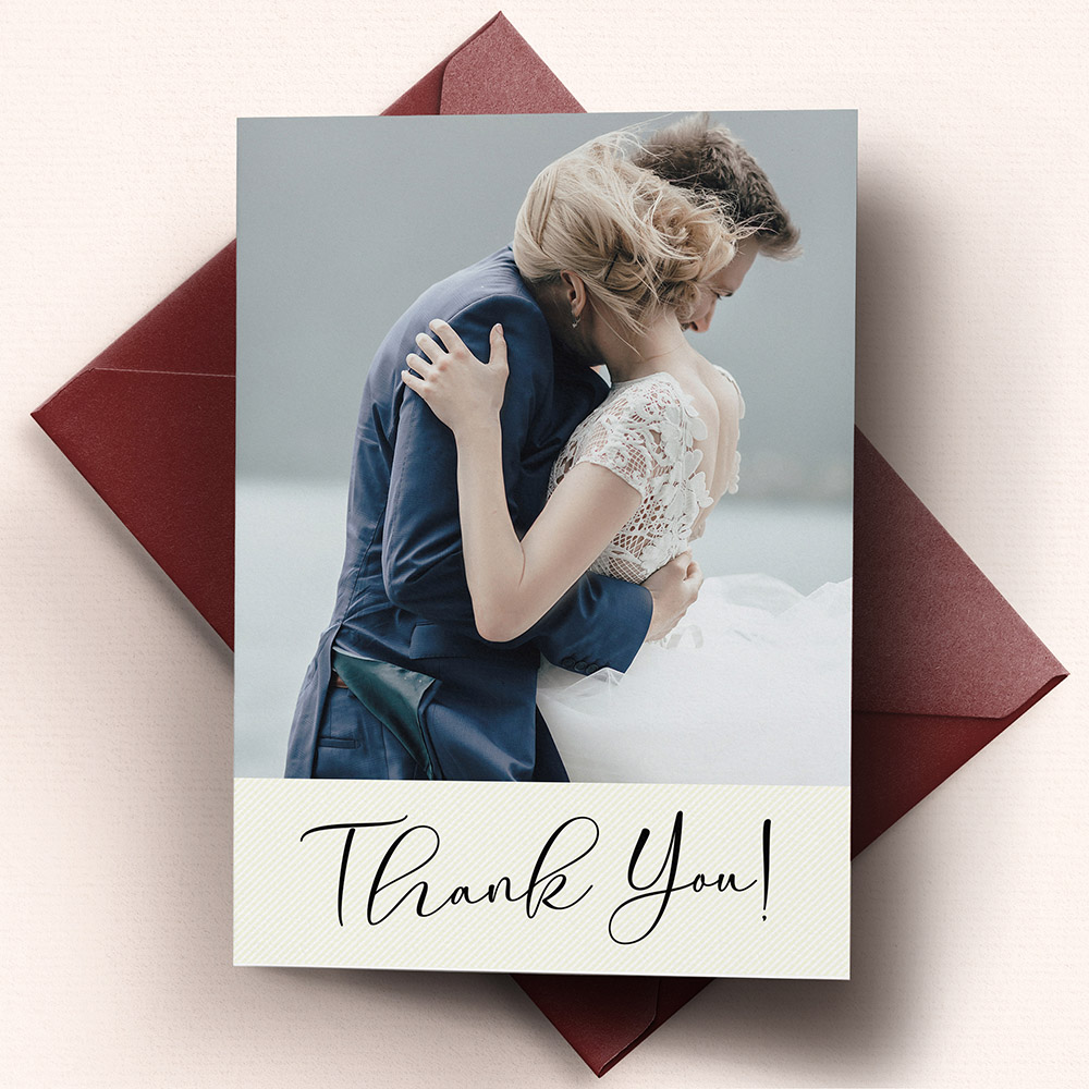 A cream, a6 portrait traditional wedding thank you card with a vintage style.