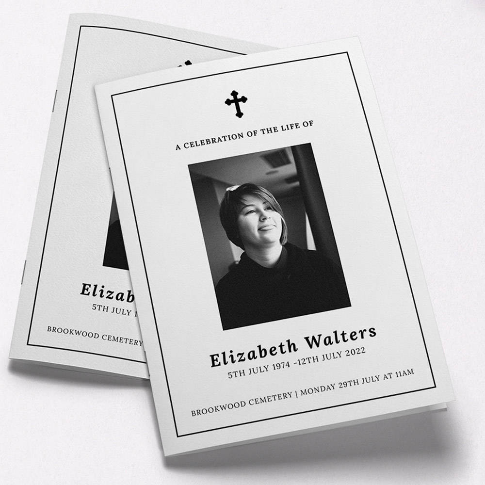 A white and black, a5 portrait stapled funeral order of service with a christian style.