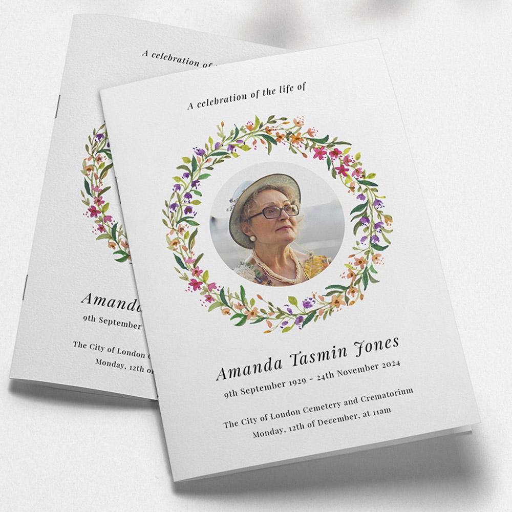 A white and green, a5 portrait multipage funeral order of service with a floral style.