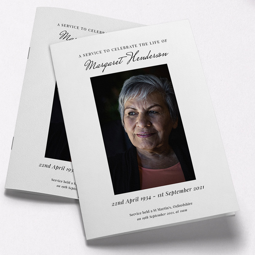 A white and black, a5 portrait multipage funeral programme with a simple style.