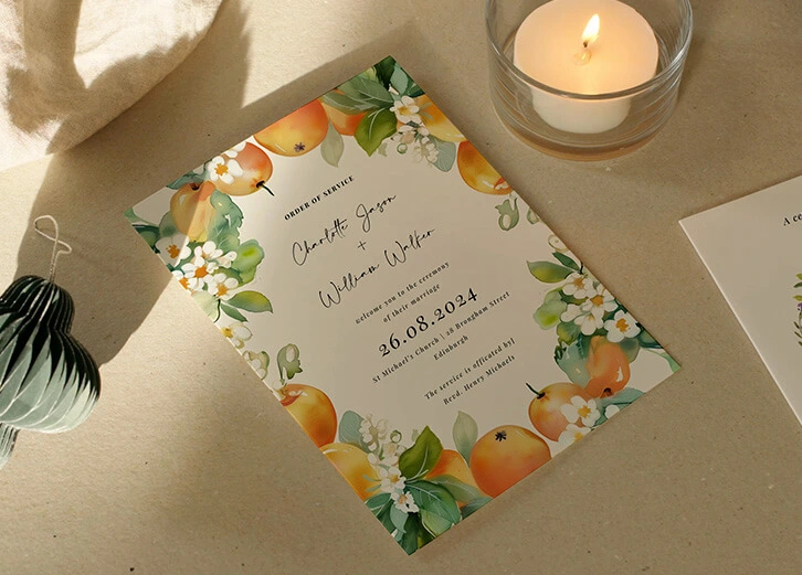 Botanical-themed wedding order of service featuring vibrant floral designs