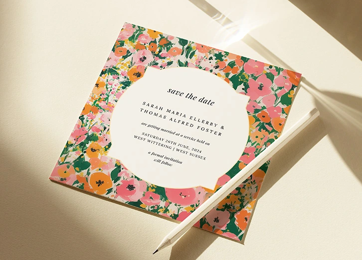 Bright and bespoke floral save the date cards with personalised details