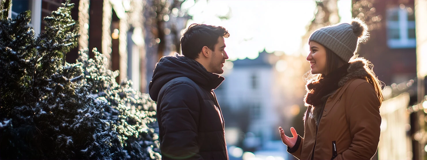 Two friends discussing personalised stationery options