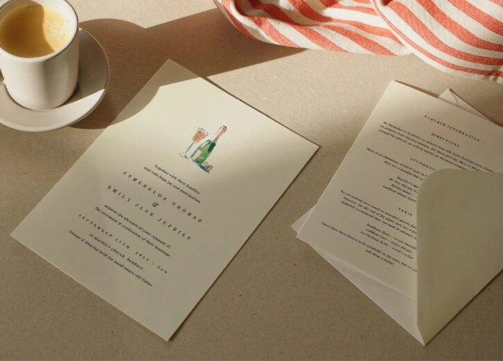 Seamless wedding invitation suite featuring elegant typography and champagne illustrations