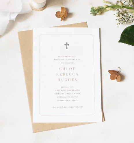 Minimalist communion invitation featuring a cross and delicate floral accents