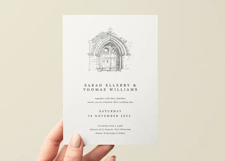 Rustic wedding invitation featuring a hand-drawn sketch of a church and elegant typography