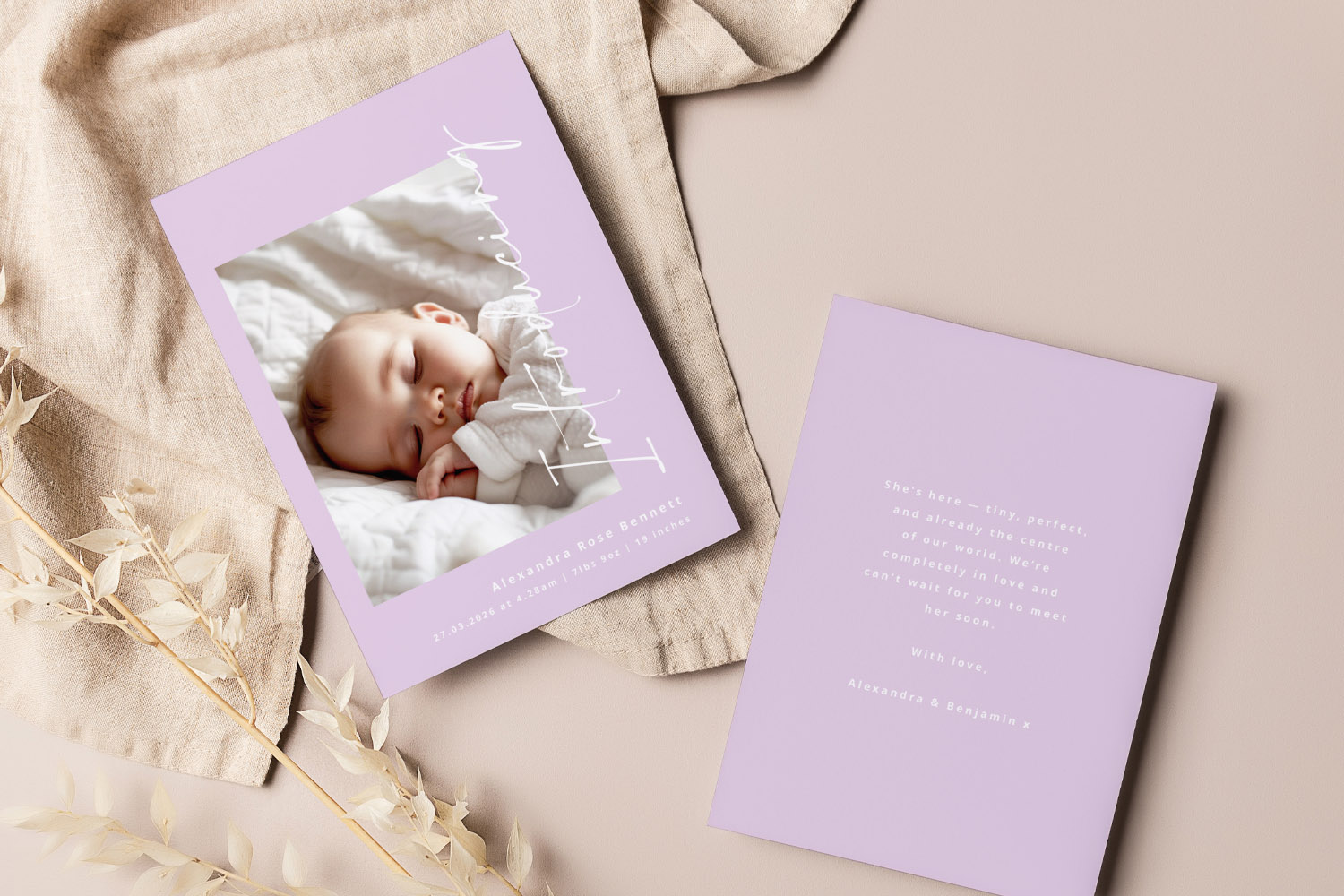 Birth announcement card with pastel lavender border, featuring a sleeping baby and elegant white text on a soft background.