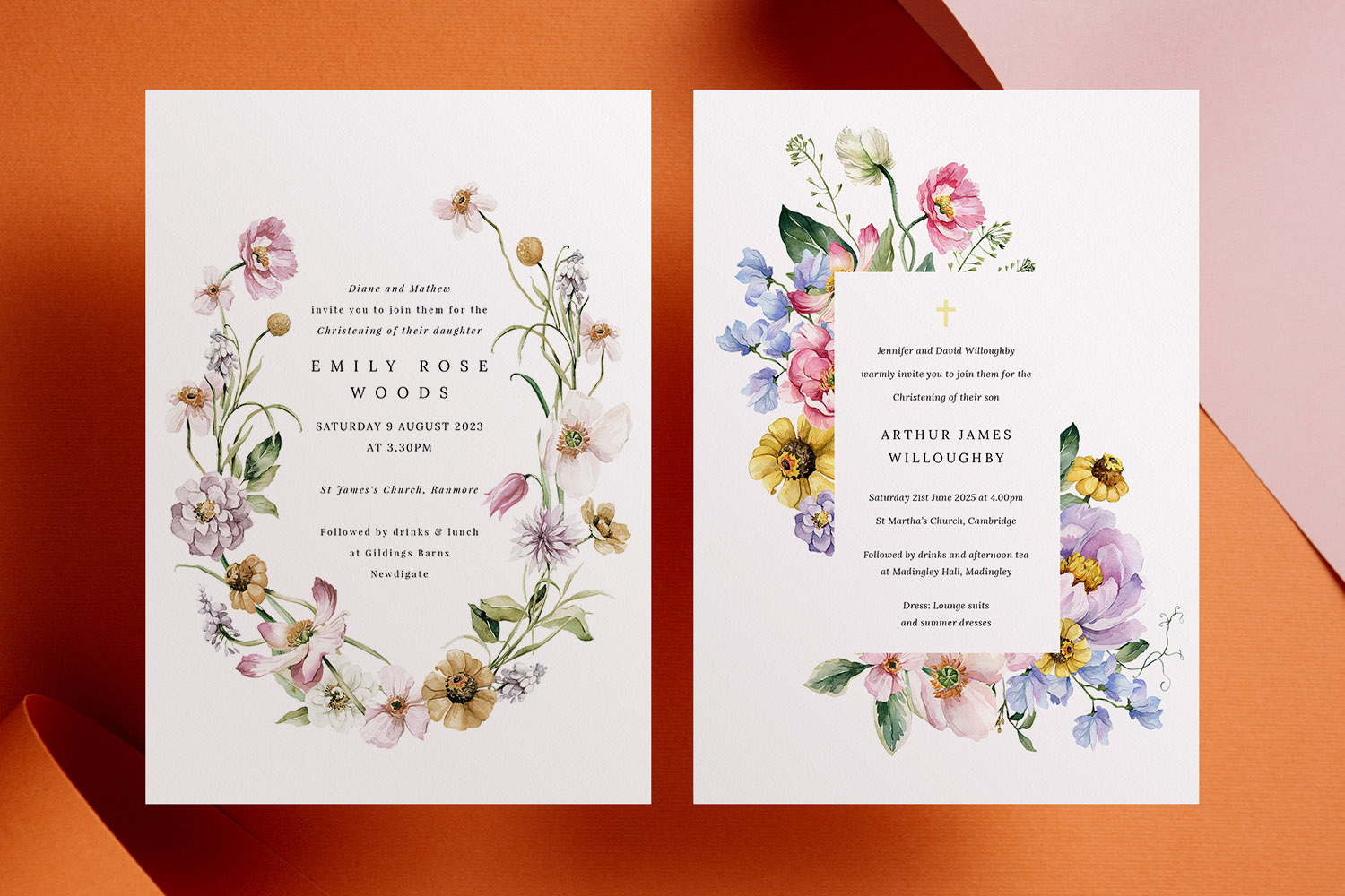 Christening invitations with delicate floral watercolour designs on textured white card, displayed on an orange and pink