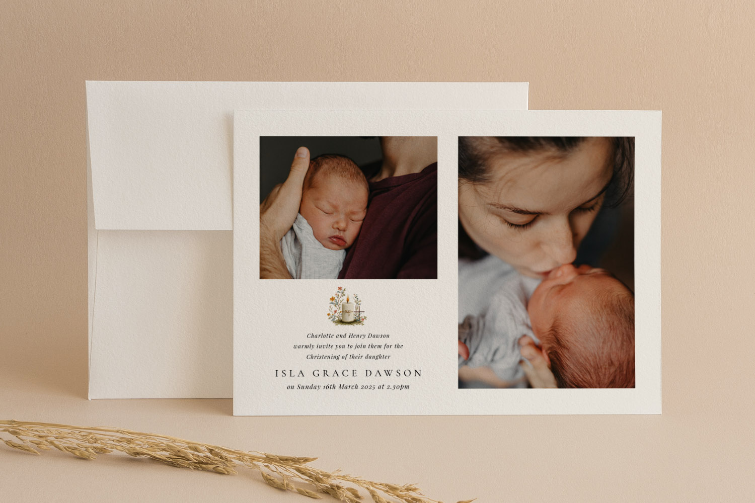 Christening invitations with two personal baby photos and elegant printed text on a white card with matching envelope