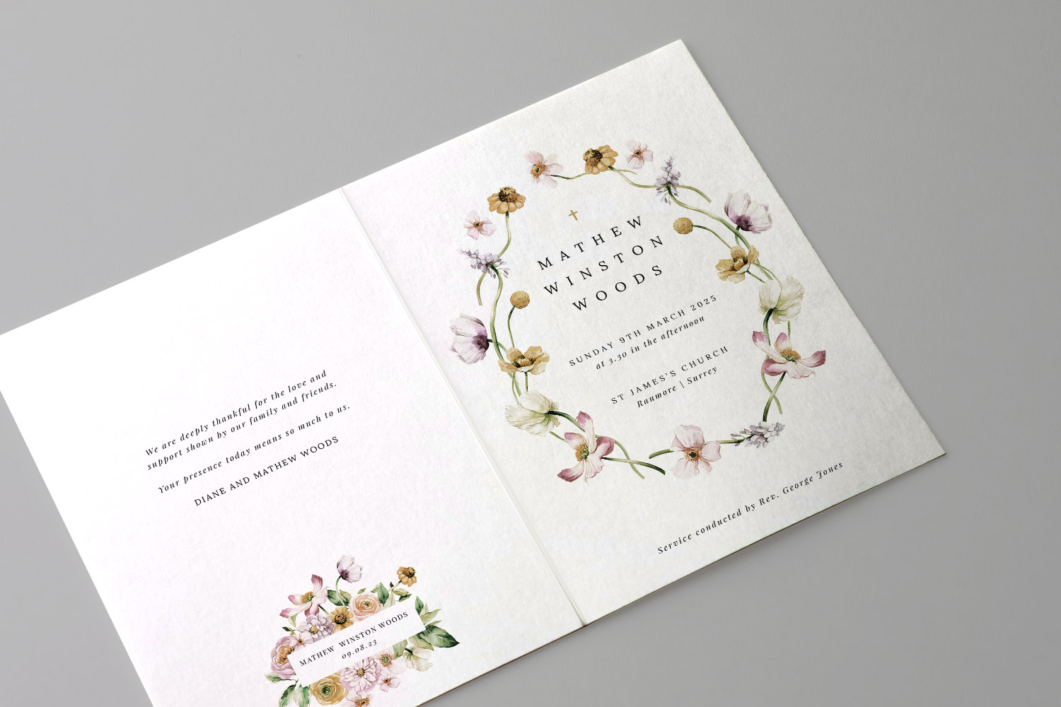 Christening order of service with delicate floral wreath design and personalised details on textured white card, shown open