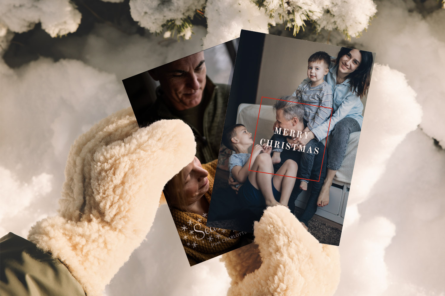 Christmas cards featuring personalised family photos held by gloved hands outdoors on fresh snow for a festive winter feel.