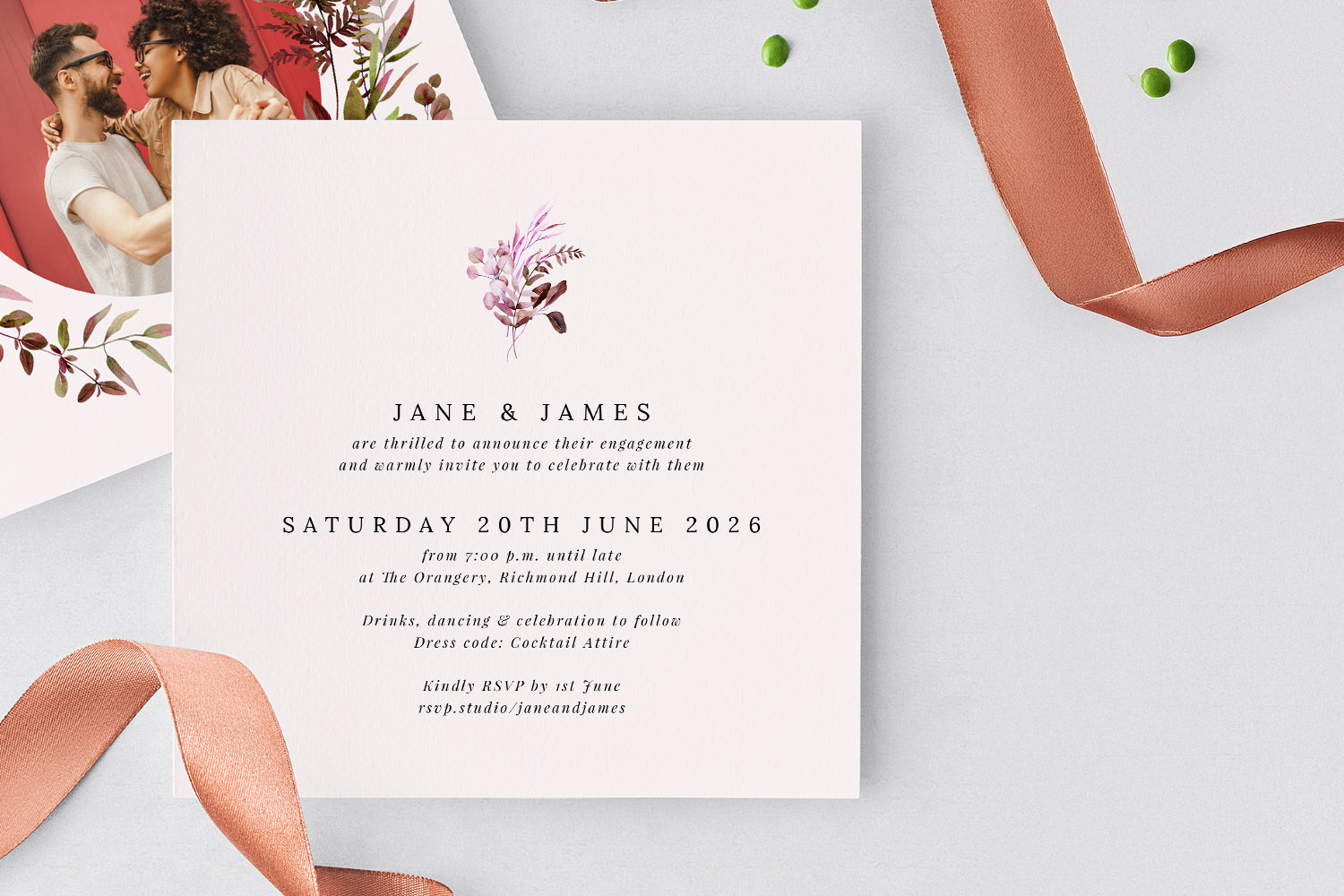 Engagement party invitations featuring elegant floral design and modern typography on a square white card, flat-lay style.