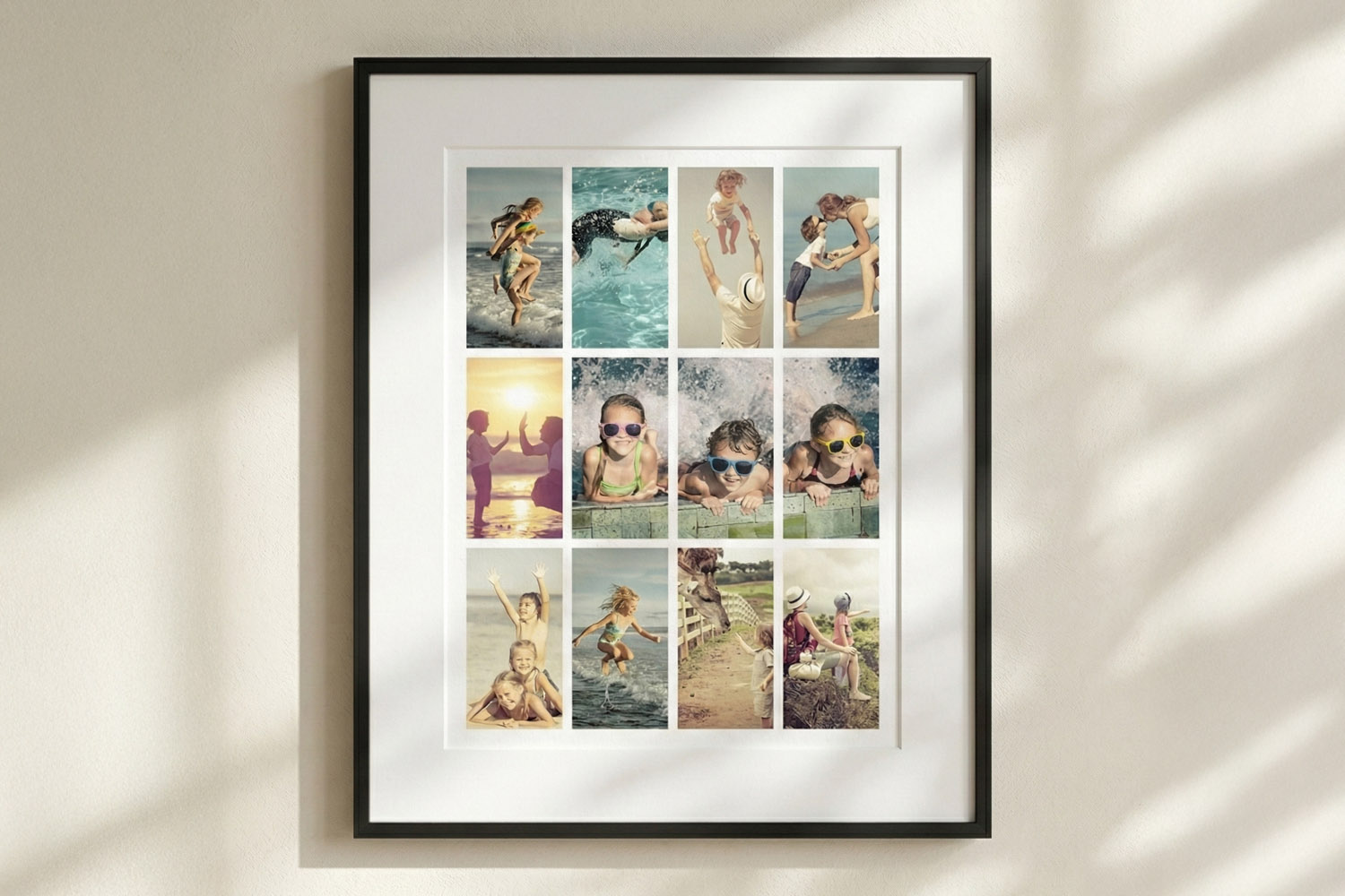 Framed and mounted prints featuring a collage of family summer photos with a white card mount and slim black frame