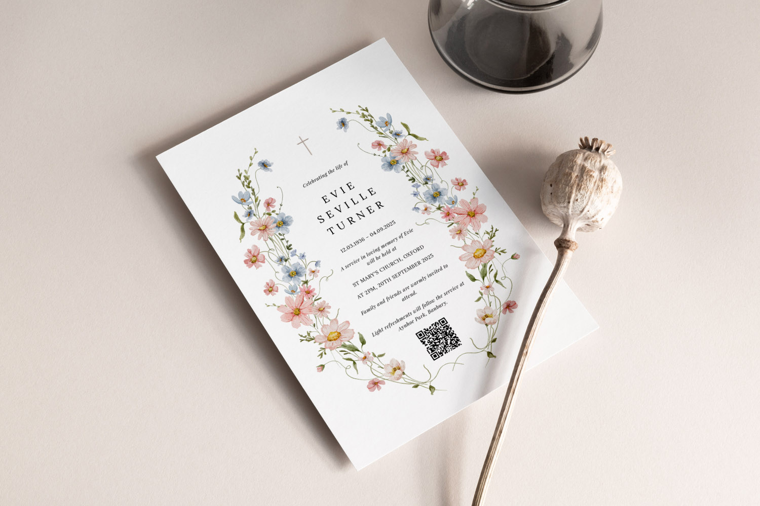 Funeral announcement card with pastel floral border, cross symbol, and QR code for digital RSVP on a neutral background.