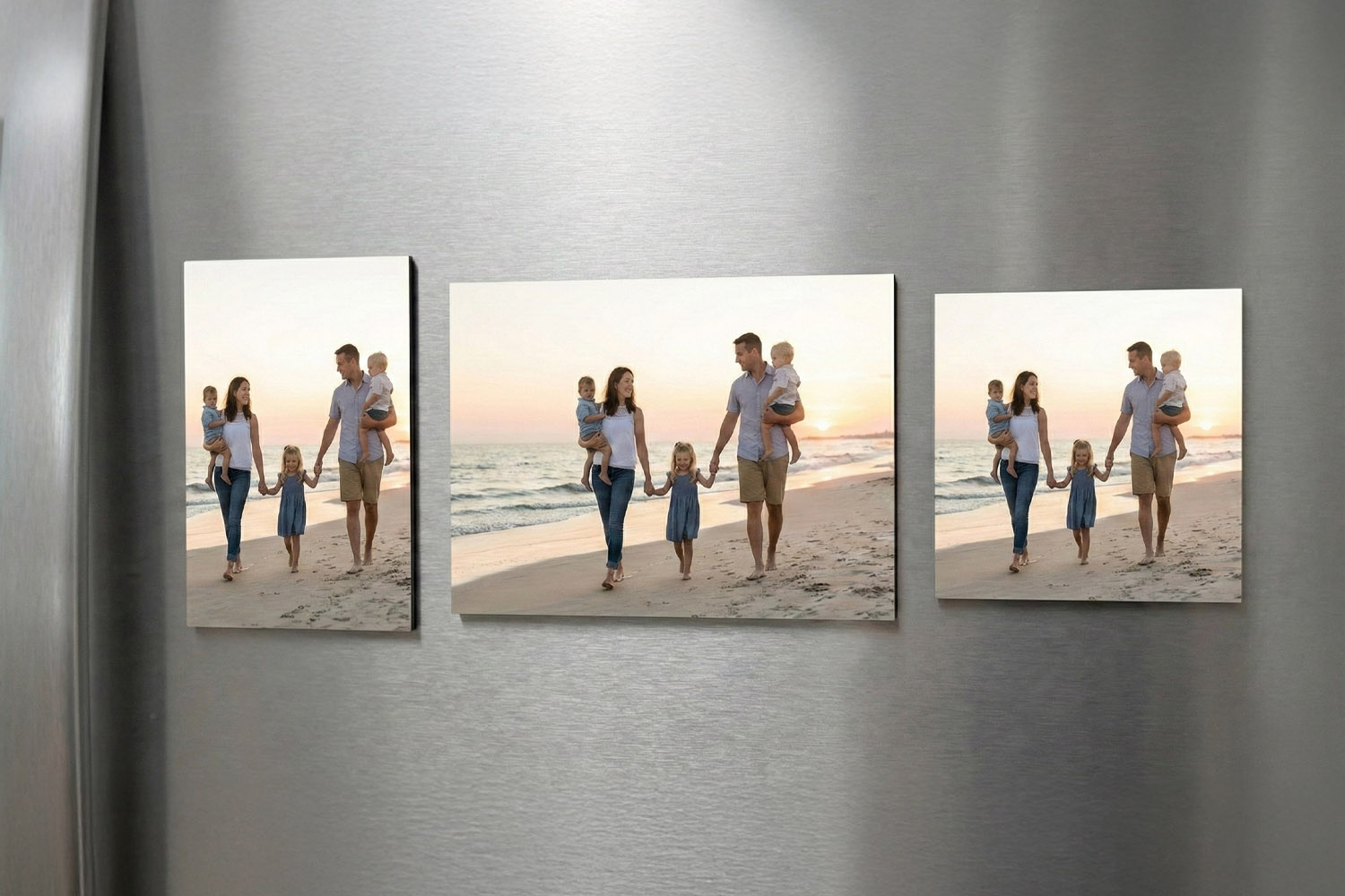 Personalised fridge magnets featuring a family beach photo in three different crop and orientation styles on a metallic