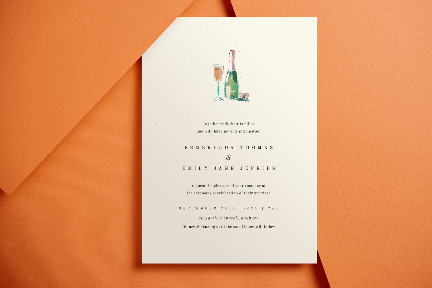 Wedding invitations featuring elegant typography and a champagne illustration on cream card, displayed on an orange