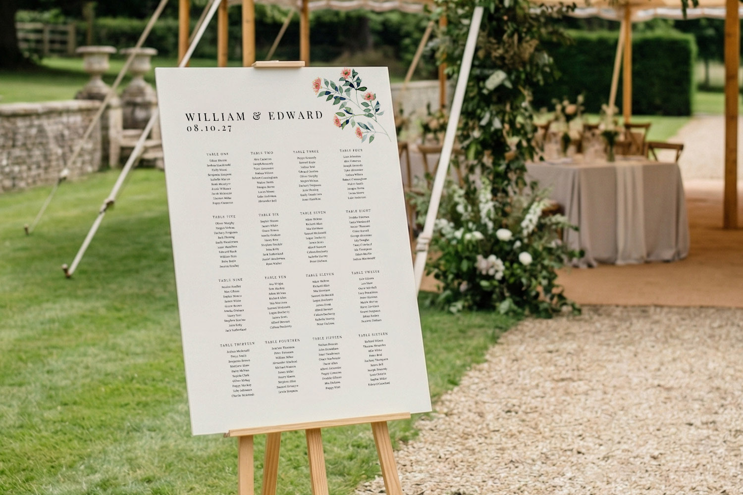 Wedding table plan with elegant typography and floral detail on a white board, displayed outdoors on a wooden easel.
